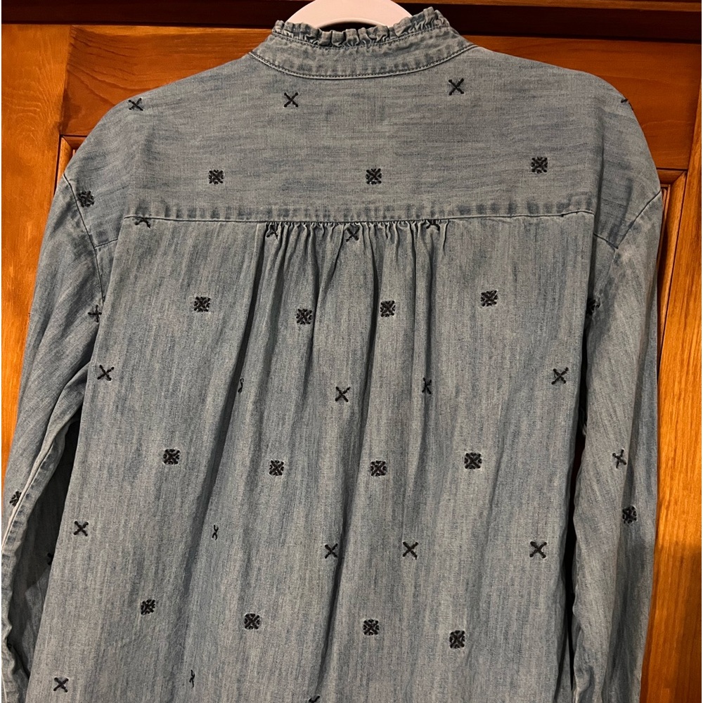 Women jeans shirt, size M, color Blue. Very light wear and in good condition.